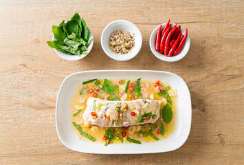 steamed sea bass fish with herbs