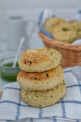 home made whole grain Bagels with wild garlic on a table