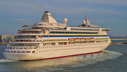 Fototapeta na wymiar Modern Aida luxury club cruiseship cruise ship liner in port and sailing for dream holiday vacation