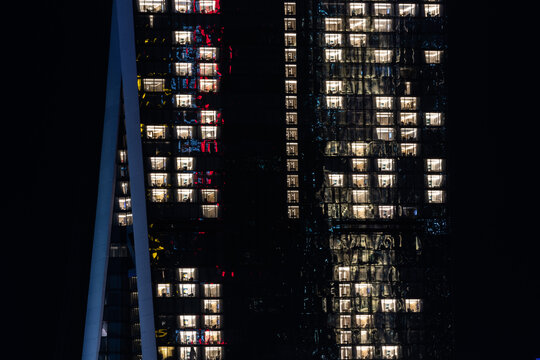 Illuminated windows at night in downtown SIngapore