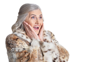 portrait of happy beautiful senior woman in fur coat