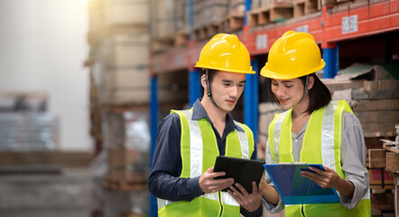 Warehouse worker working together in warehouse