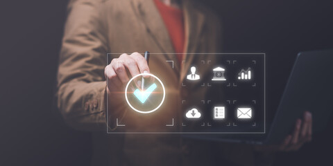 Businessman check and check mark online ,Business Agreements and Approvals ,Confirmation of contract documents or warranty card ,Approval of checklist documents ,management or quality assurance