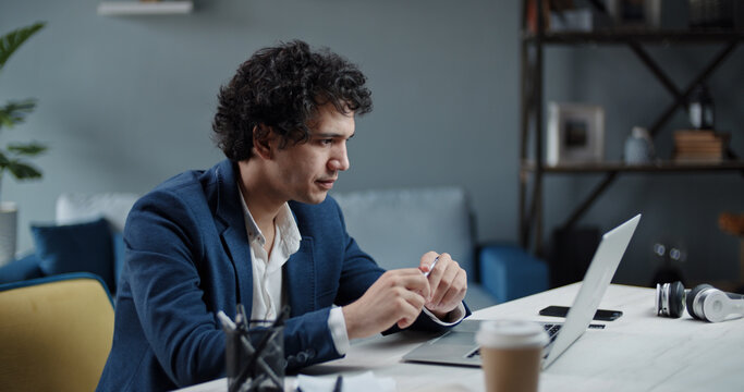 Asian Human Resources Manager Having An Online Interview Via Teleconference. Businessman Talking With Customers In Video Chat From Home Office 