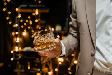 Barman pouring beer glass beautiful night