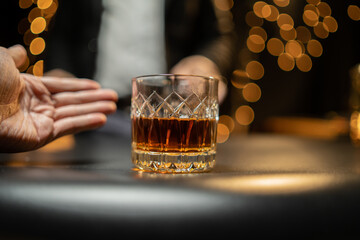 Barman pouring whiskey whiskey glass beautiful night