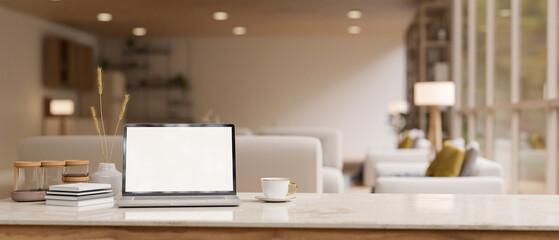 Workspace with laptop mockup on white marble table in a luxury elegance spacious lounge