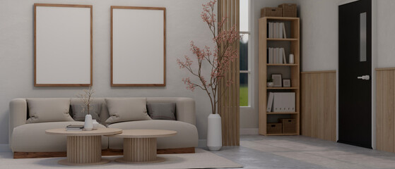 Interior of a modern and contemporary home's living room with sofa, coffee table, blank frames mockup