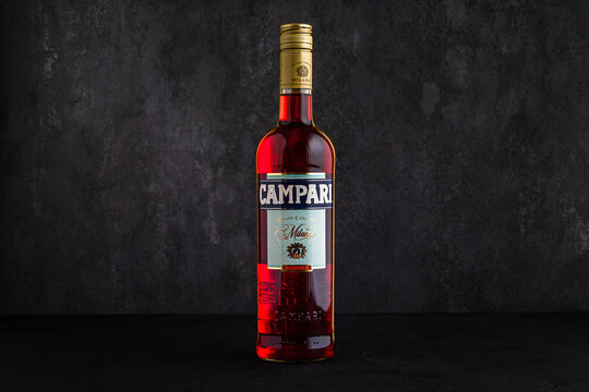 Minsk, Belarus - 14-04-2023: bottle of Campari alcoholic liqueur, dark background, product horizontal photo