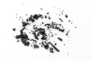 Black charcoal particles isolated on a white background, Activated charcoal powder