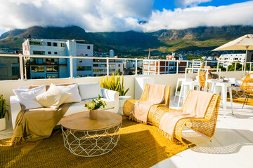 Naklejka premium Outdoor patio furniture on rooftop venue