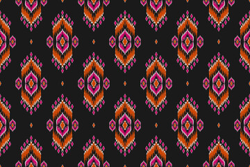 Fototapeta premium Fabric ikat pattern art. Geometric ethnic seamless pattern traditional. American, Mexican style. Design for background, wallpaper, illustration, fabric, clothing, carpet, textile, batik, embroidery.