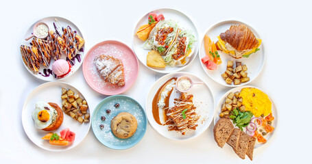 Naklejka na ściany i meble Fancy Breakfast table top angle with variety of dishes. 