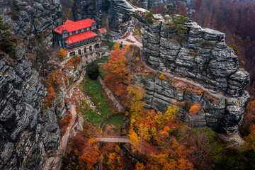 Hrensko, Czech Republic - Aerial panoramic view of the famous Falcon's Nest at Pravcicka Brana (Pravcicka Gate) in Bohemian Switzerland National Park, the biggest natural arch in Europe at autumn