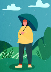 Woman in the rainy park with an umbrella