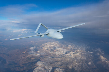 Unmanned military drone uav flying in the air, reconnaissance flight over the territory above the...