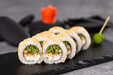 Sushi roll on dark background. Japanese and asian food concept