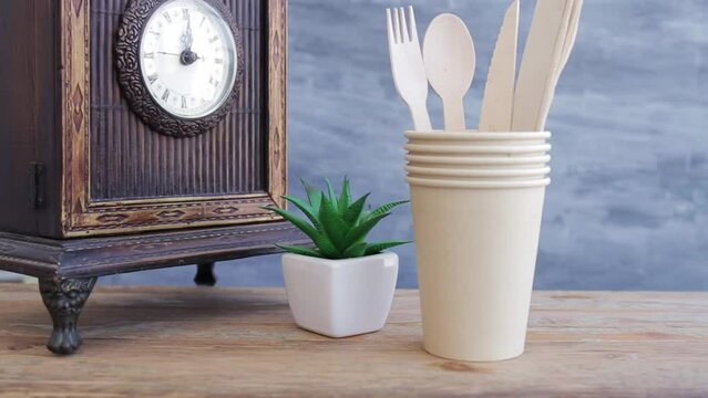 Zero waste, plastic free,recyclable, sustainable utensils including fork, spoon, knife, cups, napkin and a bag with copy space. Can be used as a food delivery ad...