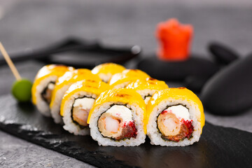 Sushi roll on dark background. Japanese and asian food concept