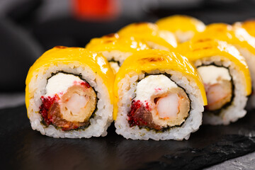 Sushi roll on dark background. Japanese and asian food concept