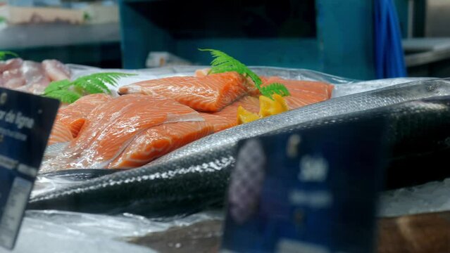 Salmon filets on ice in fish market