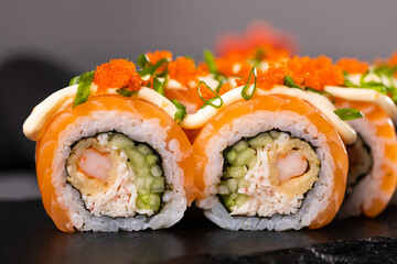 Sushi roll on dark background. Japanese and asian food concept