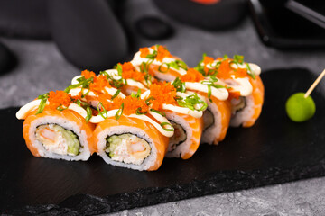 Sushi roll on dark background. Japanese and asian food concept