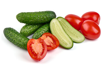 Cucumbers and tomatoes, close-up, isolated on white background.