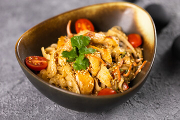 Udon stir-fry noodles with chicken and vegetables. Asian cuisine