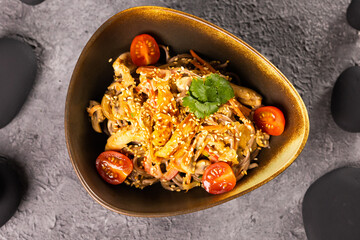 Udon stir-fry noodles with meat and vegetables. Asian cuisine