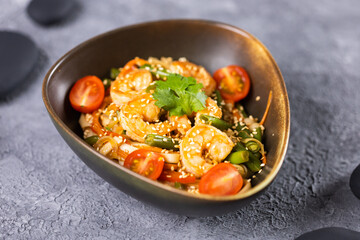 Udon stir-fry noodles with shrimp and vegetables. Asian cuisine