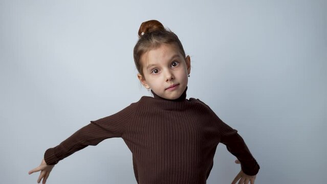 Cute girl looking camera shocked surprised say wow
