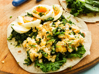 Pitas with eggs and greens