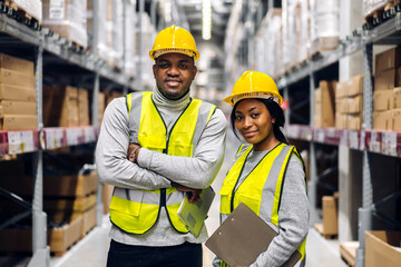 Portrait african american engineer team shipping order detail on tablet export and import,goods,factory,warehouse,international trade,transportation,cargo ship,logistic,distribution.business industry