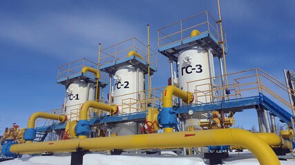 Gas pipeline structures on a sunny winter day in the north of Russia