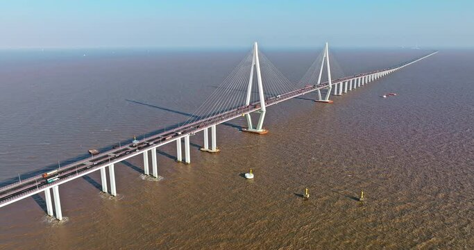 Aerial view of Hangzhou Bay Bridge scenery in Jiaxing, Zhejiang Province, China. The total length of the bridge is 36 kilometers. The design speed is 100 kilometers per hour. 