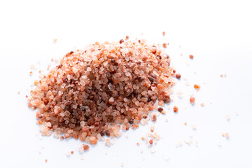 Himalayan pink salt isolated on white background with copyspace