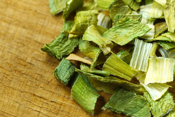 Fototapeta premium Dry chopped spring onion leek. Chopped dried green onion or scallion. Spices and herbs.