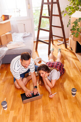 Couple searching for home redecoration ideas