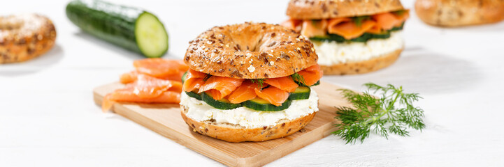 Bagel sandwich with salmon and cream cheese for breakfast panorama