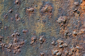 An extremely rusted metal plate in Spain.