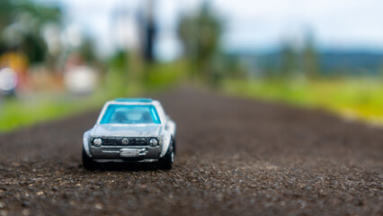 Fototapeta na wymiar minahasa, Indonesia : January 2023, toy car in the rice field