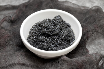 Fresh black fish roe imitated in dish