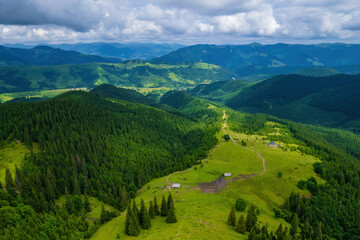 Naklejka na ściany i meble Peaceful scene of misty mountains. Location place of Carpathians mountains, Ukraine, Europe. Photo wallpaper. Aerial photography, top view drone shot.