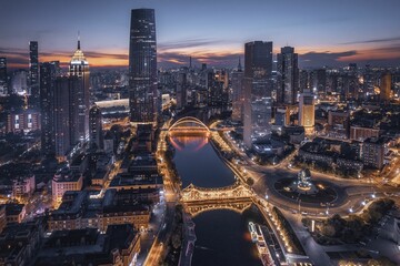 Aerial shot of the city of Tianjin and the River Haihe at sunset, modern cityscape