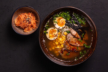 Bowl of ramen noodle soup with meat