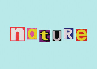 Nature word from cut out magazine colored letters