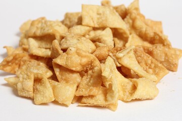 Pile of Crispy Fried Wontons From Chinese Restaurant Isolated on White background