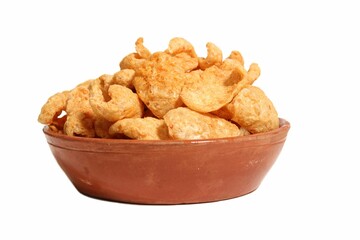 Bowl of Fried Pork Rinds Isolated on a White Background