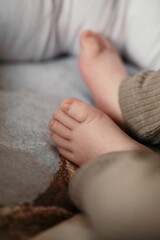 Closeup shot of the bare toes of the newborn baby